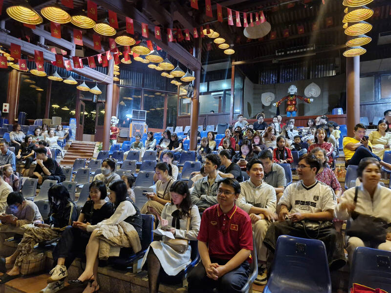 Many tourist groups book tickets to watch water puppetry and traditional art forms in Vietnam. Photo: Thu Giang