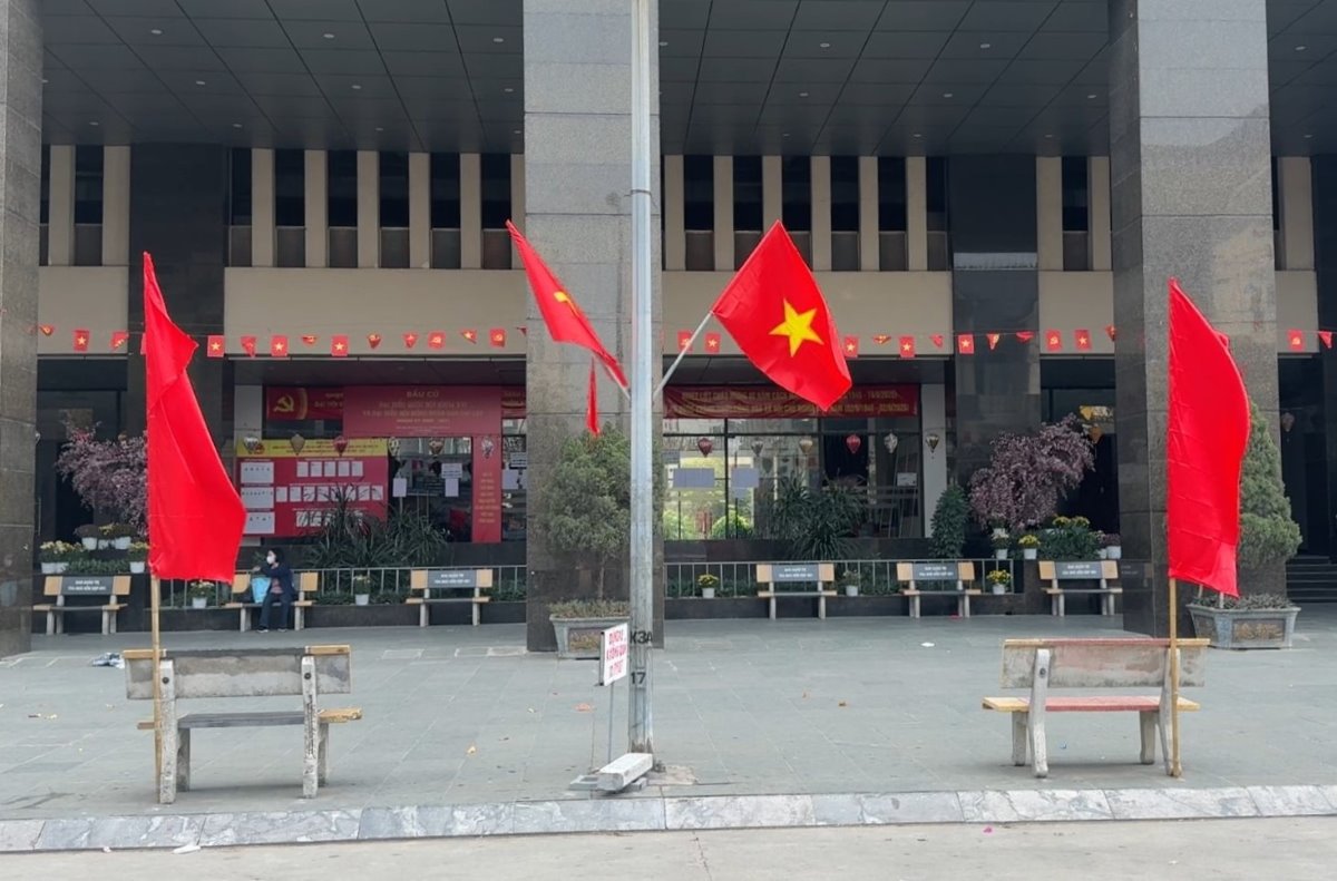 Apartment buildings in Hanoi are brilliant with national flags before election day