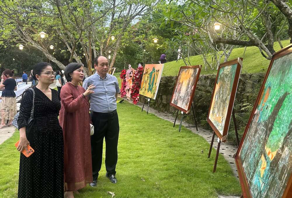 Paintings on display at the exhibition. Photo: Ngo Hien