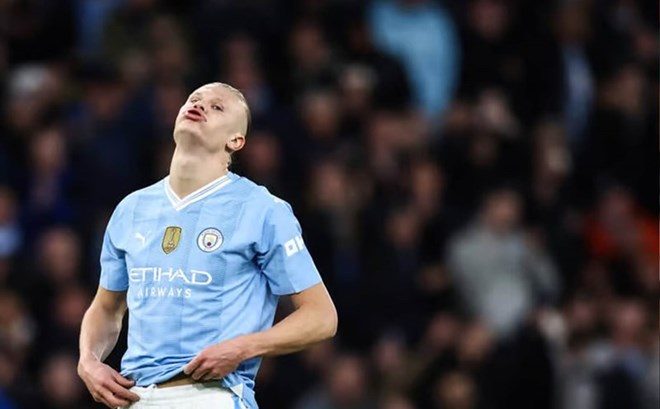 Pep Guardiola phải tìm ra cách để Haaland hồi sinh trở lại.  Ảnh: AFP