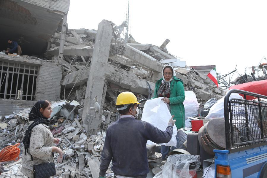 People transport furniture found from destroyed houses in Tehran, Iran, March 12, 2026. Photo: Xinhua