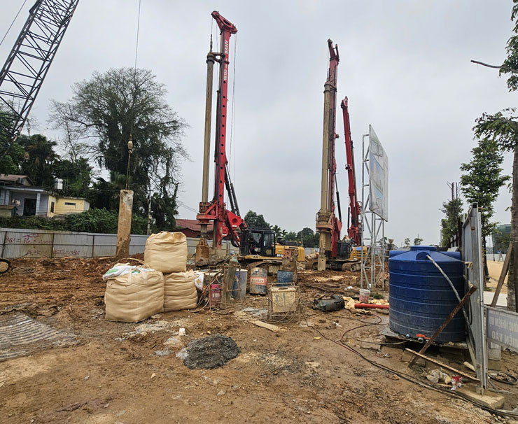 Phối cảnh và công trường xây dựng dự án NƠXH Bình Minh Tây Bắc. Ảnh: Bảo Nguyên