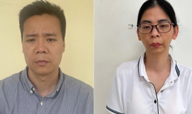 Bị can Nguyễn Năng Mạnh (bên trái) và một bị can trong vụ án bị Cơ quan Cảnh sát điều tra Bộ Công an đề nghị truy tố. Ảnh: Bộ Công an