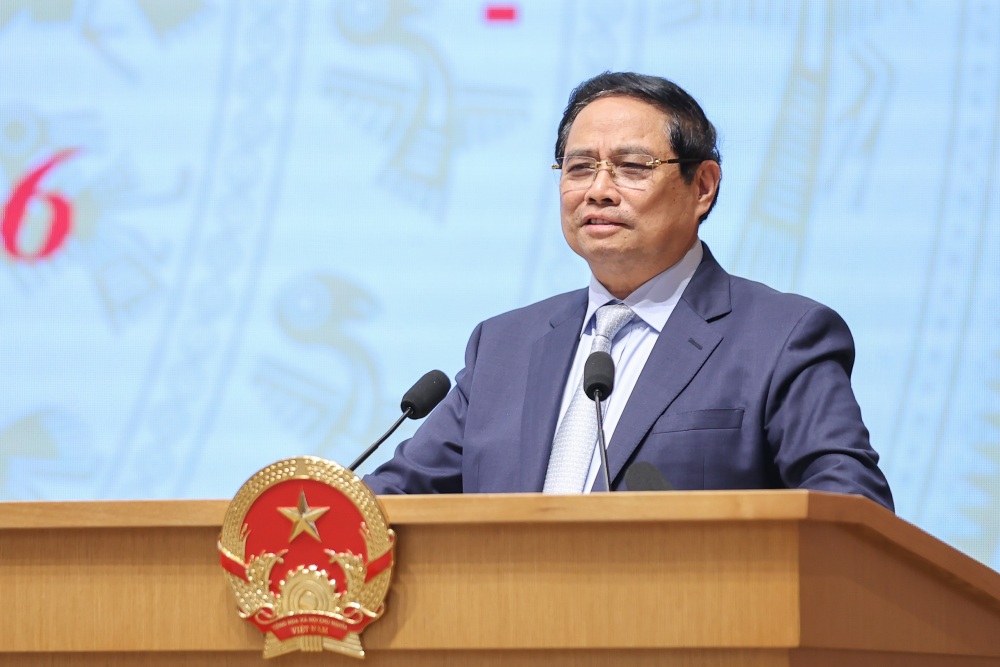 Prime Minister Pham Minh Chinh requested businesses to raise practical problems for the State to respond promptly. Photo: VGP