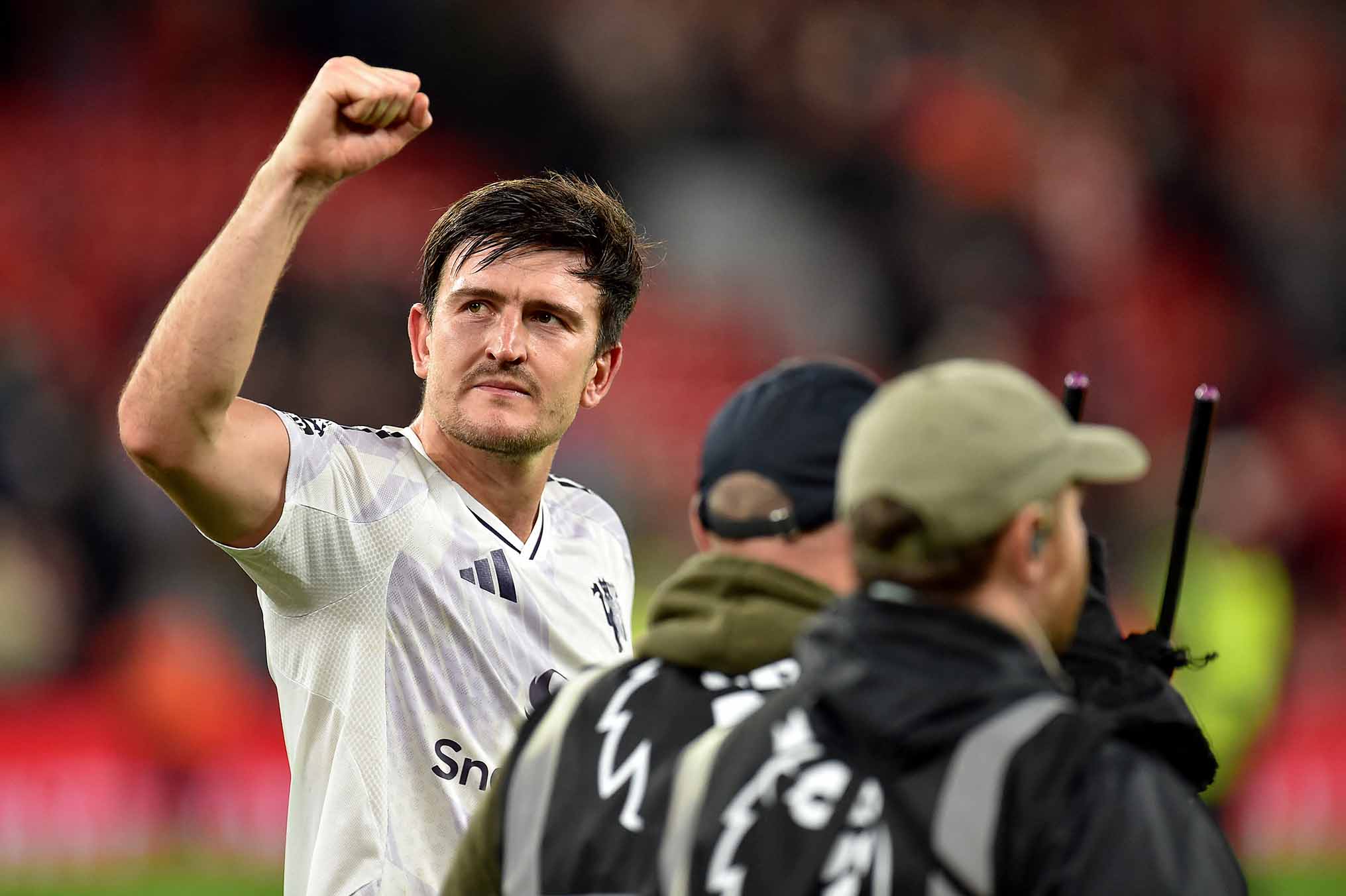 Harry Maguire will stay at Man United for at least another year. Photo: AFP