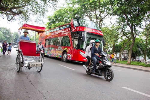 Hanoi studies piloting electric cyclos to serve tourists. Photo: Phan Anh Phu