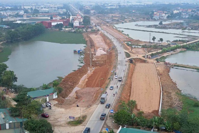 Quarter II. 2026, Hanoi completes site clearance for National Highway 6, Ba La - Xuan Mai section. Photo: Huu Chanh