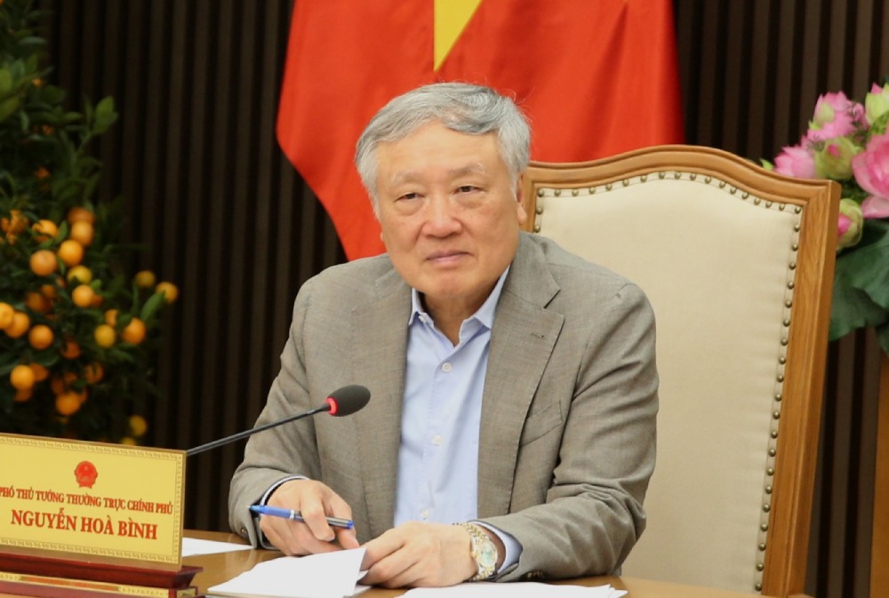 Standing Deputy Prime Minister Nguyen Hoa Binh chaired a meeting with a number of ministries, branches, central agencies and 2 localities, Ho Chi Minh City and Da Nang, on the International Financial Center in Vietnam. Photo: Nguyen Hoang