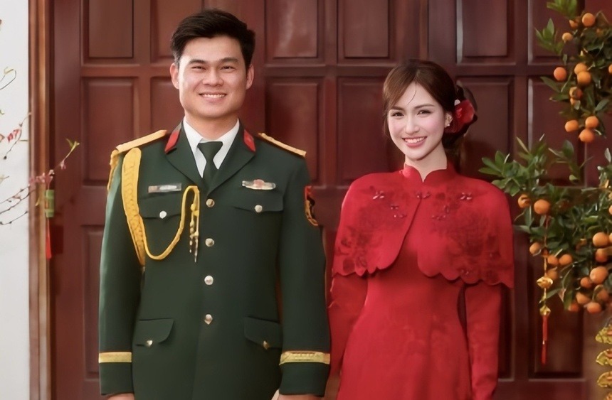 Hòa Minzy chia sẻ hình ảnh MV mới bên cạnh một quân nhân. Ảnh cắt từ video