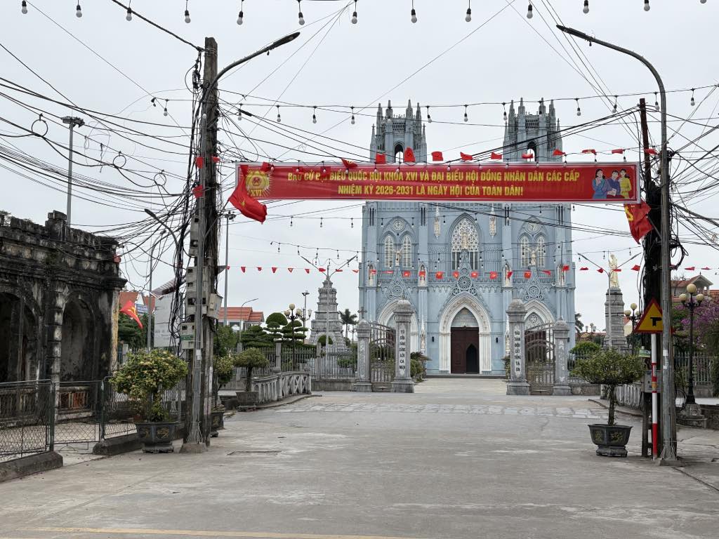 Banners are hung in front of Phu Nhai Church in the commune. Photo: Bao Han