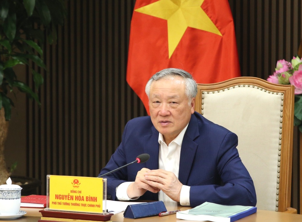 Standing Deputy Prime Minister Nguyen Hoa Binh chairs a meeting on finalizing the draft Operating Regulations of the Vietnam International Finance Center. Photo: VGP/Nguyen Hoang