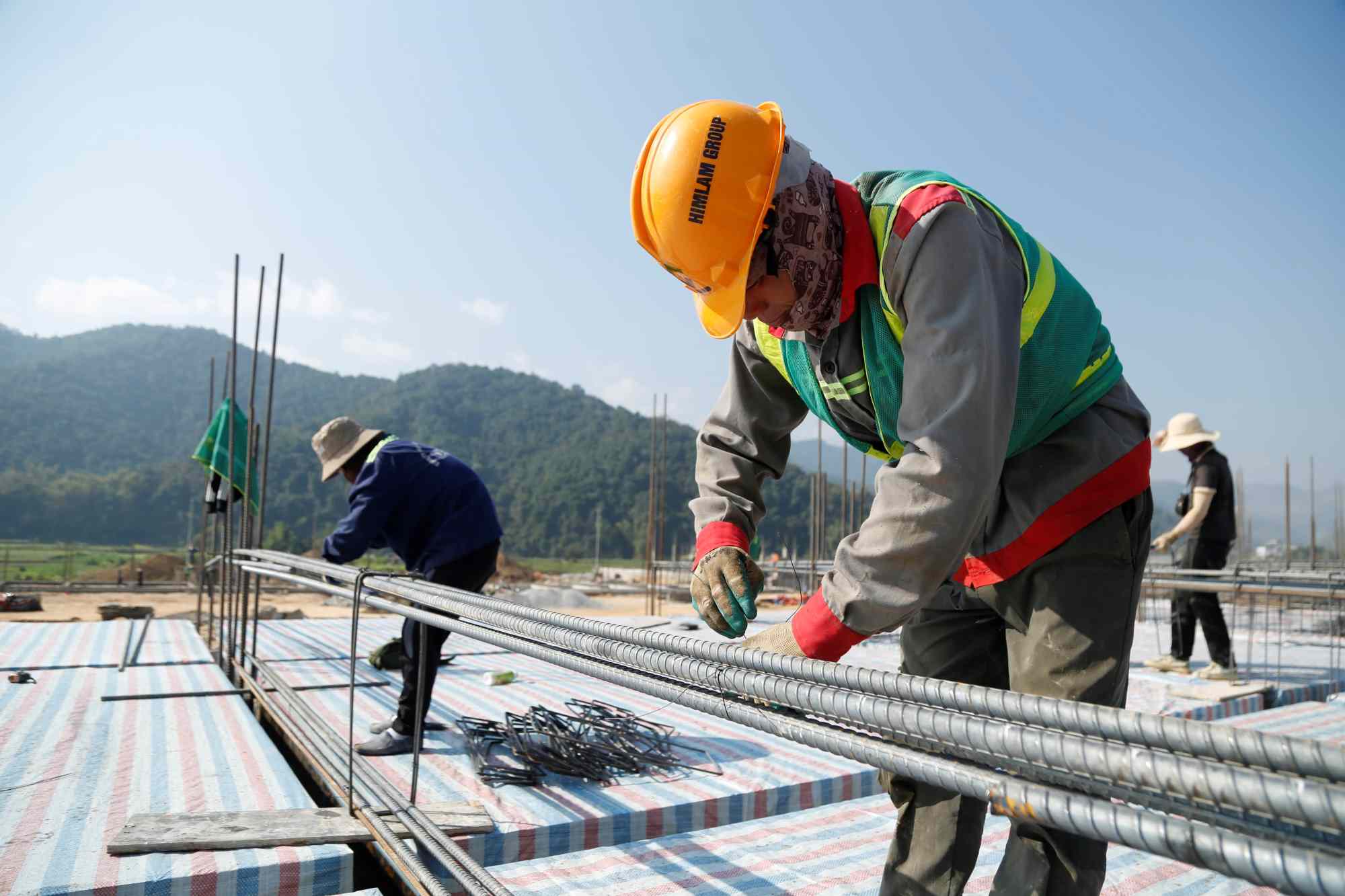 Construction workers at Thanh Yen Inter-level Boarding Primary and Secondary School. Photo: Quang Dat