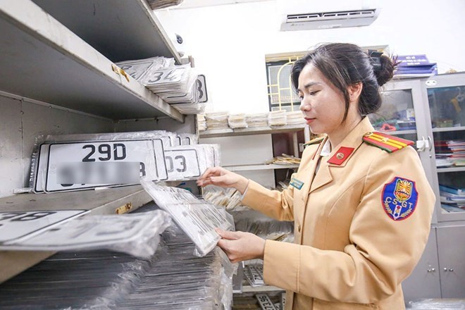 Theo Bộ Công an, việc không sang tên với xe máy sẽ bị phạt tiền theo quy định. Ảnh: Tiến Trạch