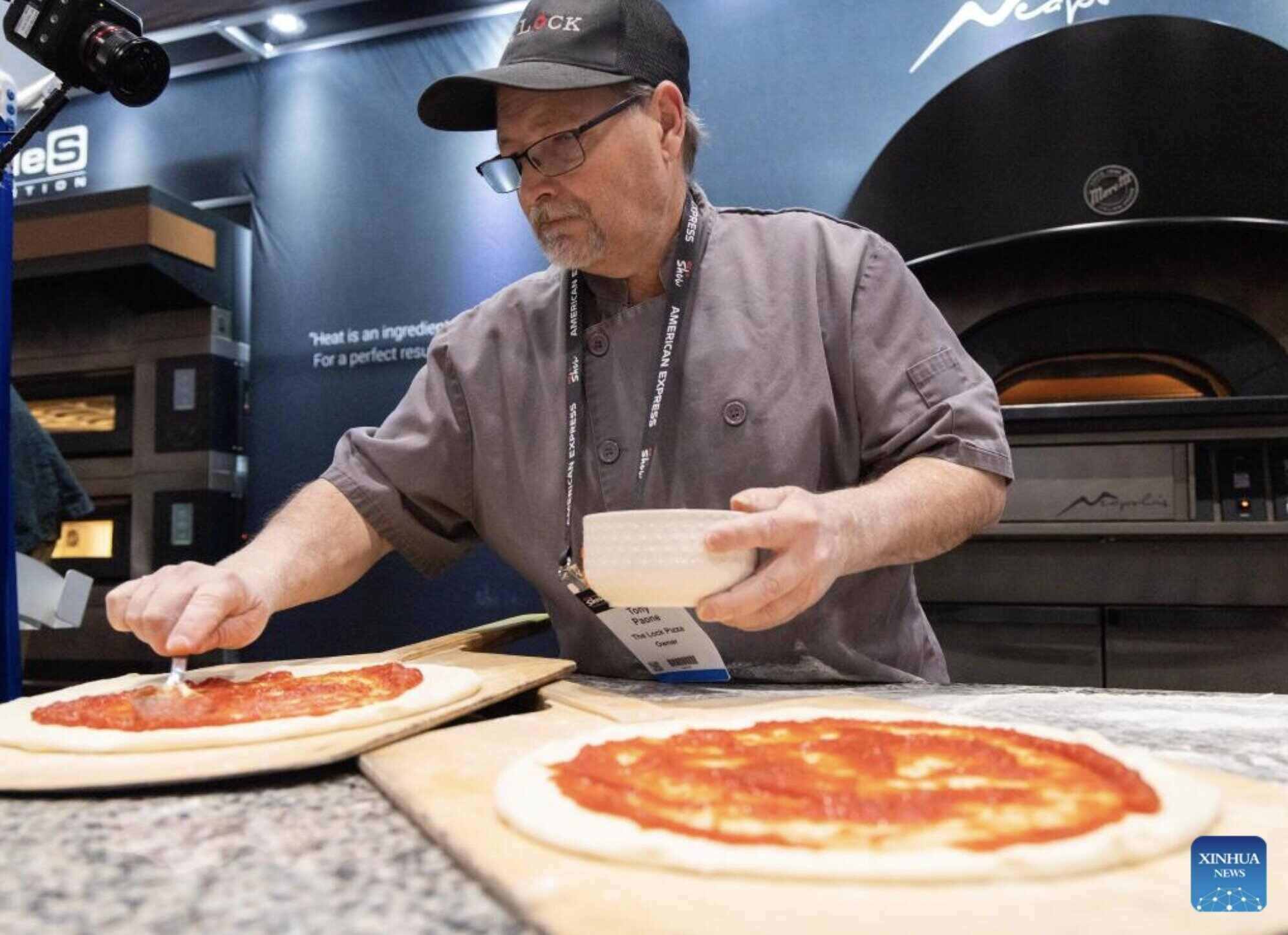 Nền ẩm thực Italy được UNESCO công nhận là Di sản văn hóa phi vật thể. Ảnh: Xinhua