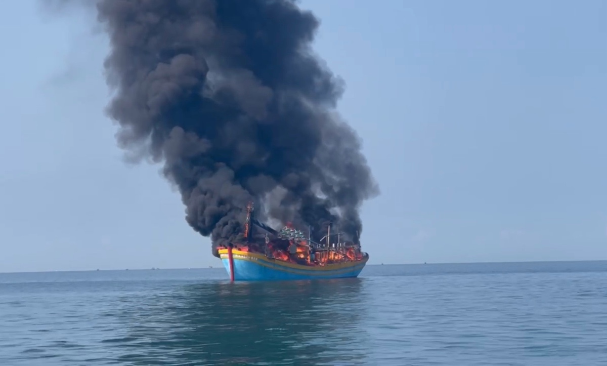 Fire scene of fishing boat at sea in Phan Thiet