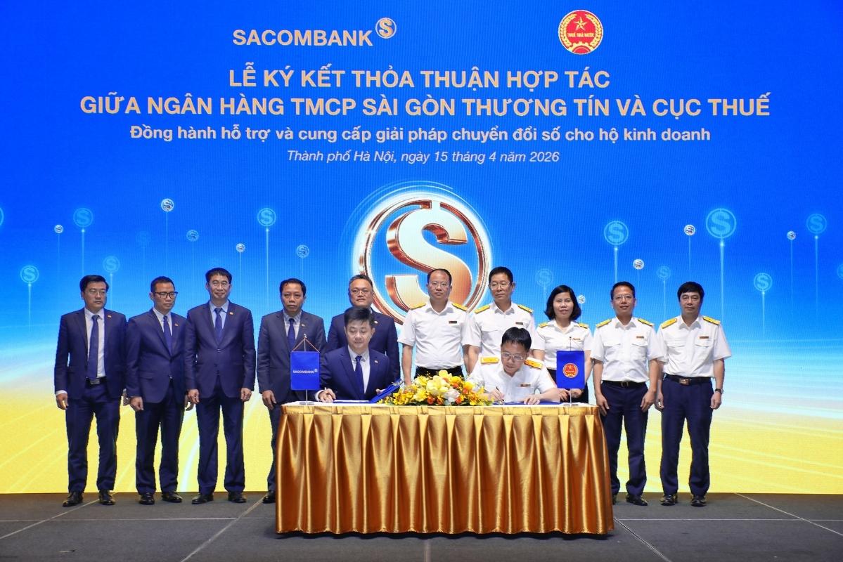 Nghi thức ký kết hợp tác giữa Sacombank và Cục Thuế. Ảnh: Sacombank