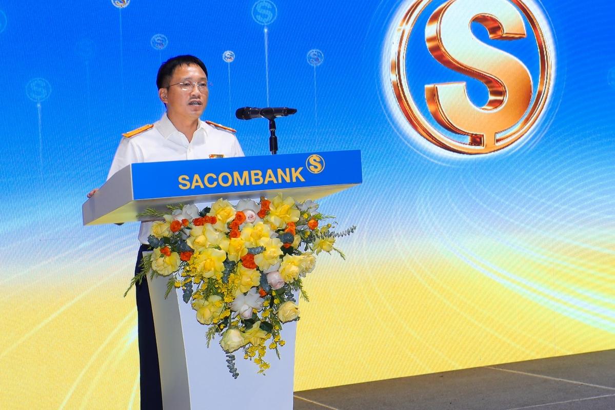 Mr. Mai Son - Deputy Director of the Tax Department wishes to spread solutions for business households in 34 provinces and cities and the 350 base tax system. Photo: Sacombank