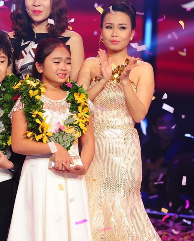 Ca sĩ Cẩm Ly là huấn luyện viên của Thiện Nhân trong cuộc thi Giọng hát Việt nhí 2014. Ảnh Nhà sản xuất 