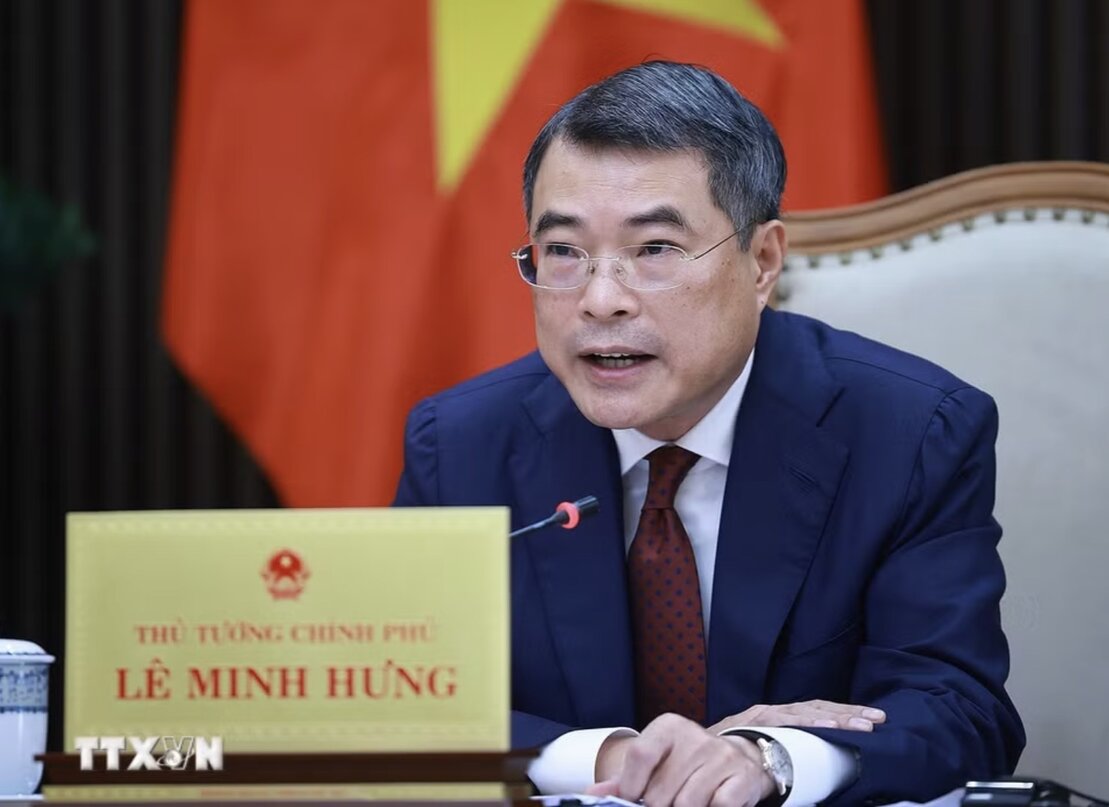 レ・ミン・フン政治局委員、首相は、シンガポールに対し、ベトナムの国際金融センターの建設を支援するよう要請しました。写真:TTXVN