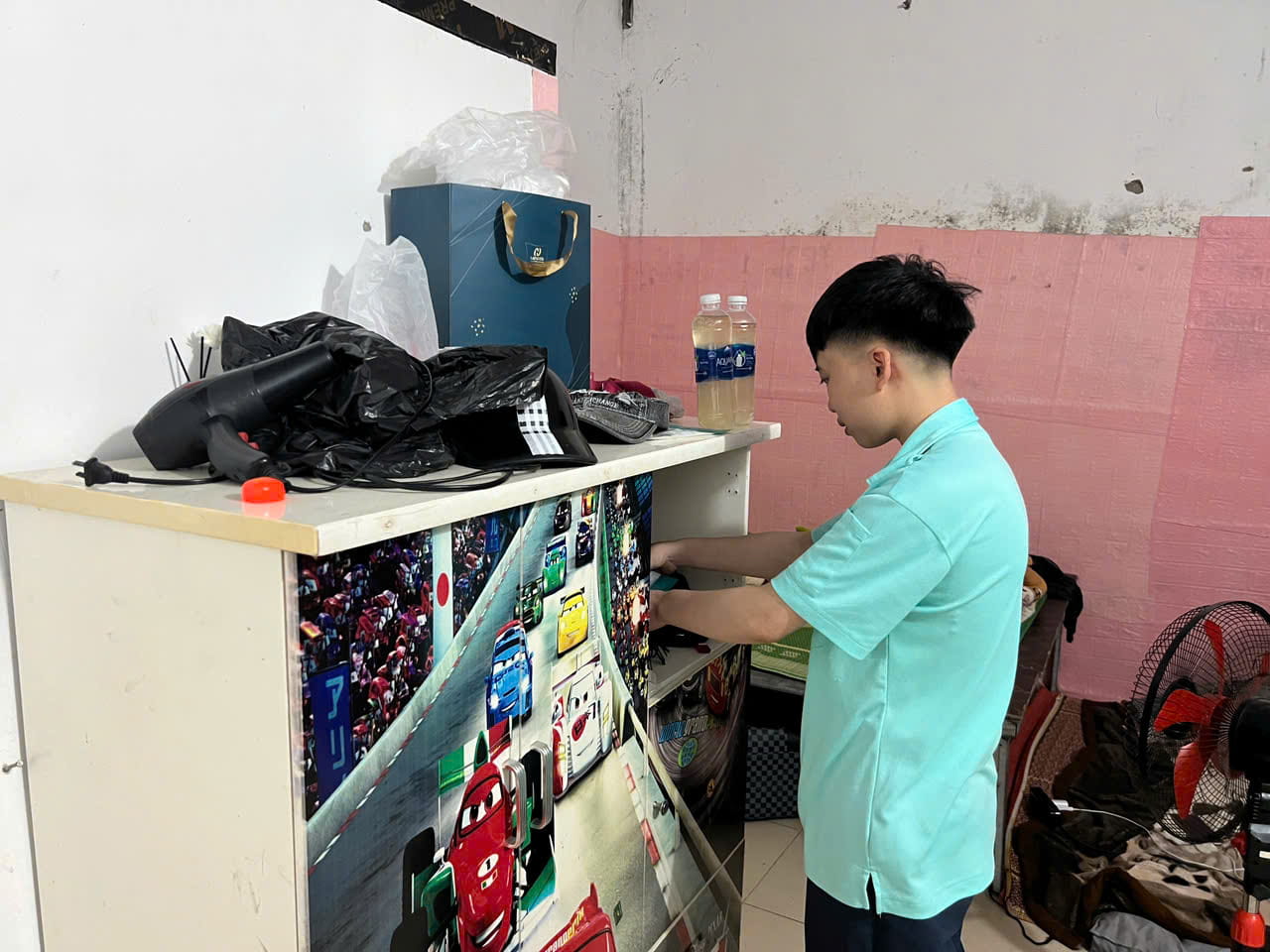 Worker Lo Thi Ha Quy in her rented room. Photo: Minh Huong.
