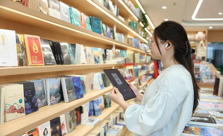 Vu An Khanh at a bookstore on Chua Lang street, Hanoi. Photo: Hai Nguyen