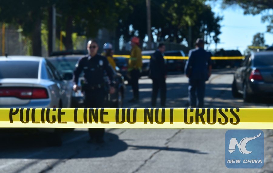 Police protect the scene of a shooting in the US. Photo: Xinhua