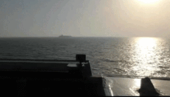 US ship fires naval artillery at Iranian cargo ship. Photo: CENTCOM