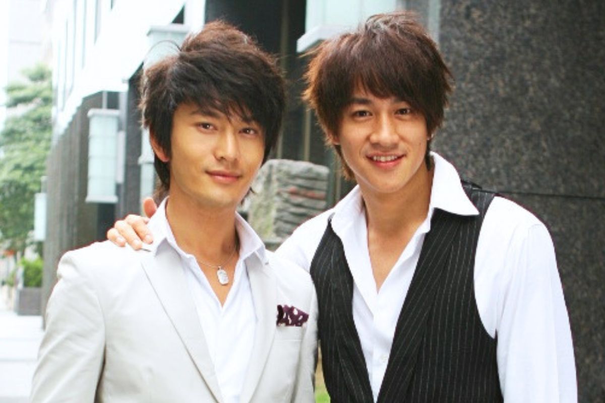 Huang Xiaoming and Peter Ho. Photo: Xinhua