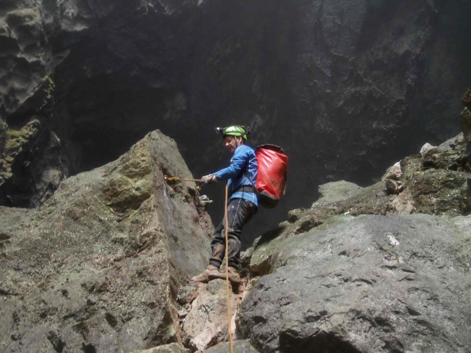 Mr. Howard Limbert during a cave survey. Photo: Oxalis Adventure