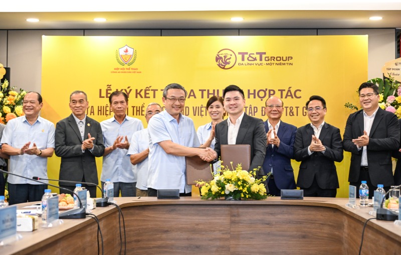 La Asociación de Deportes de la Policía Popular de Vietnam y el Grupo T&T firman un acuerdo de cooperación. Foto: Comité Organizador