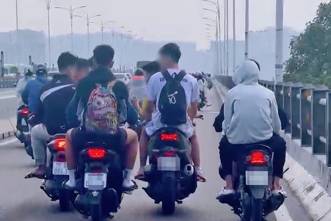 Không đội mũ bảo hiểm khi tham gia giao thông sẽ bị phạt đến 600.000 đồng. Ảnh: Tô Thế