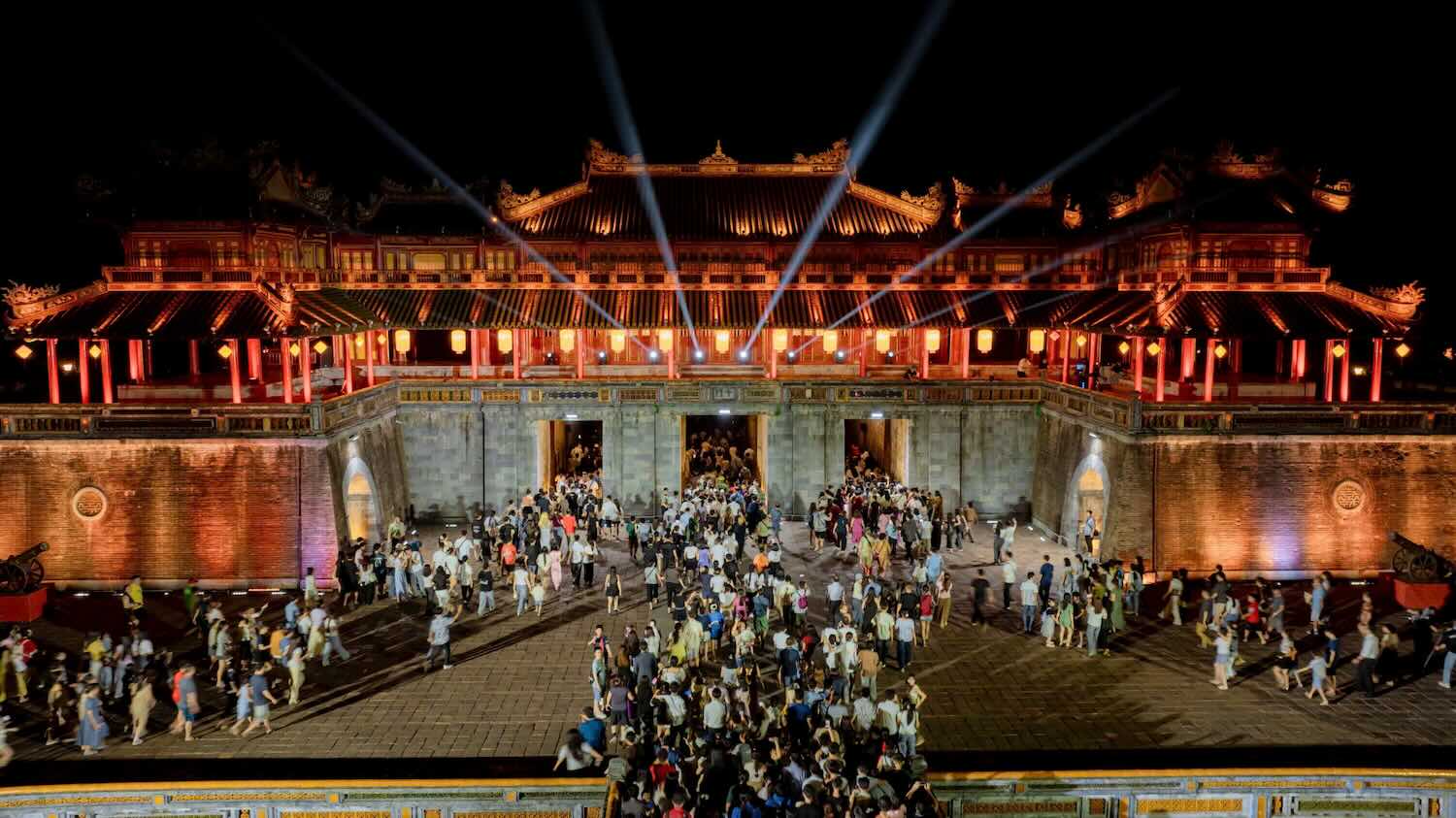 Tourists visit Hue Citadel at night. Photo: Le Hoang