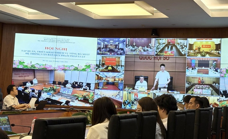 Màn hình trực tuyến tại điểm cầu Trung ương. Ảnh: Bộ Tư pháp 