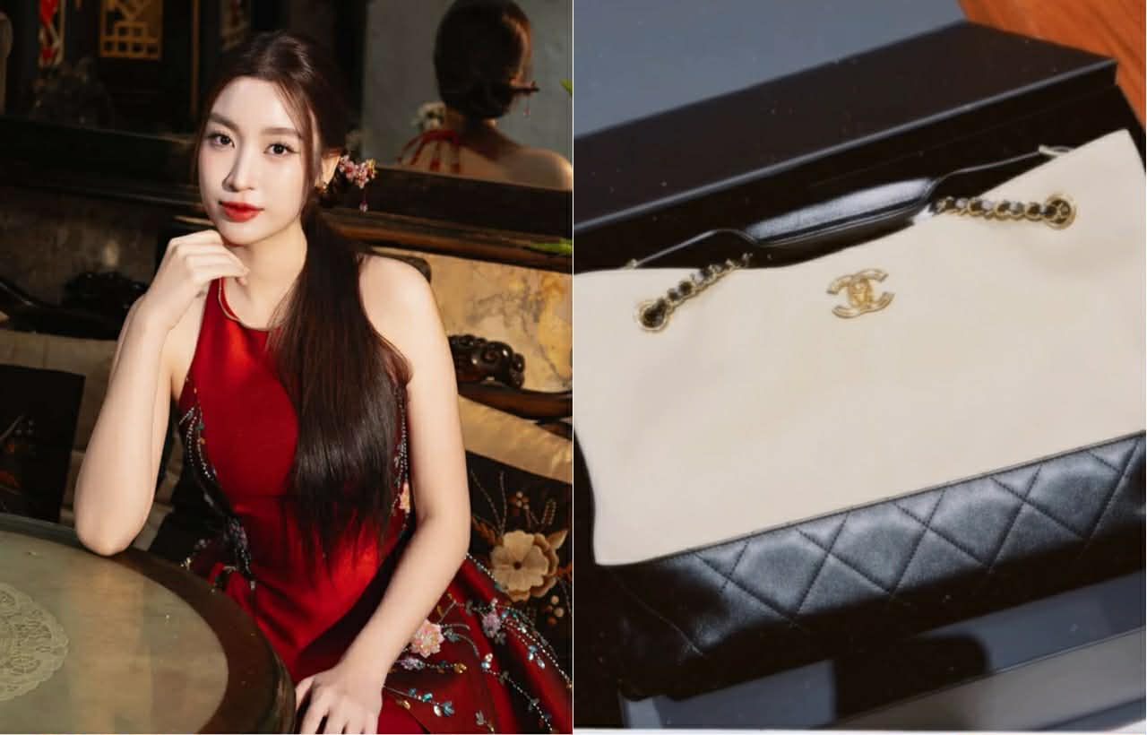 Đỗ Mỹ Linh nhận món quà từ anh trai chồng. Ảnh: Cắt từ video