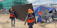 Workers brave the sun to construct during the holiday at the Trade Union social housing project, contributing to accelerating the project progress. Photo: Hoang Loc