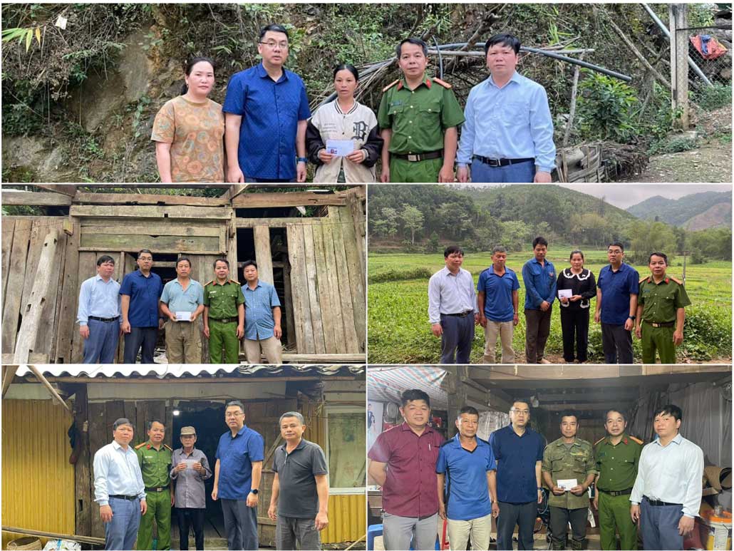 Đoàn công tác trao tặng quà cho các hộ gia đình bị thiệt hại do thiên tai. Ảnh: Công an xã Minh Khai