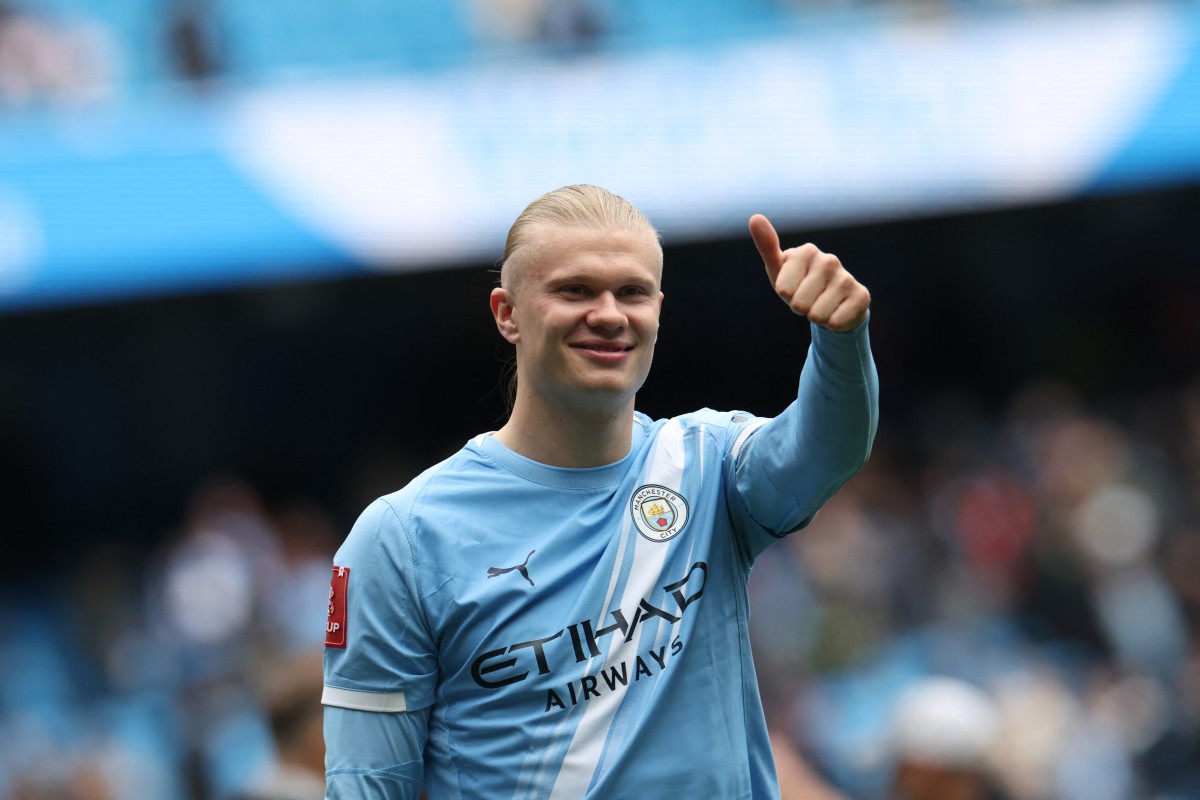 Erling Haaland scores a hat-trick against Liverpool. Photo: AFP