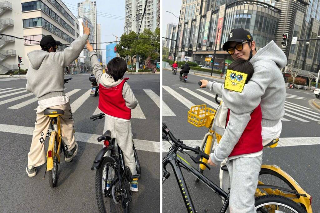 Huỳnh Hiểu Minh và con trai có nhiều cử chỉ thân thiết. Ảnh: Xinhua