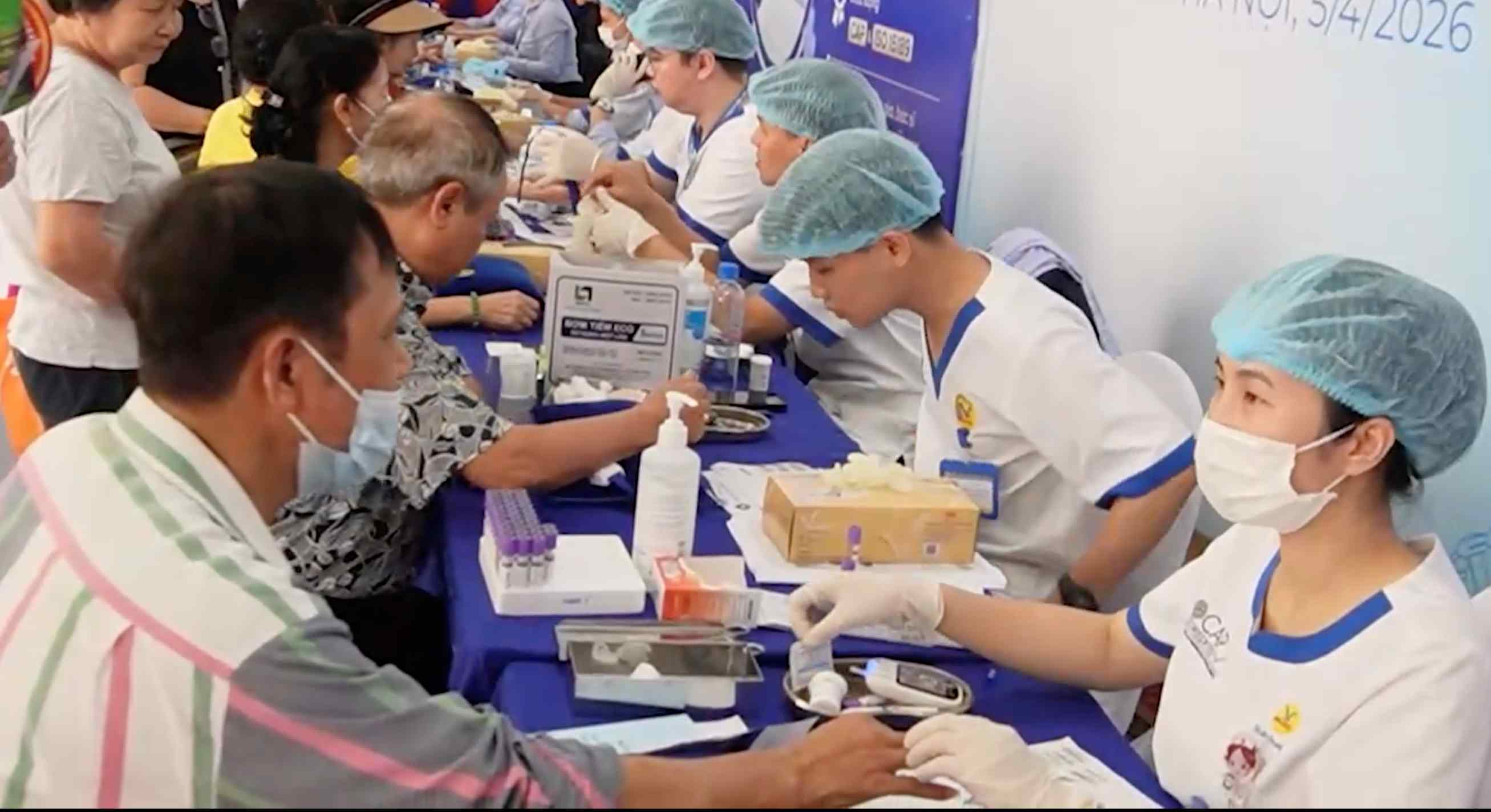 People are given free health check-ups in Hanoi on April 5. Photo: Hoang Khoi
