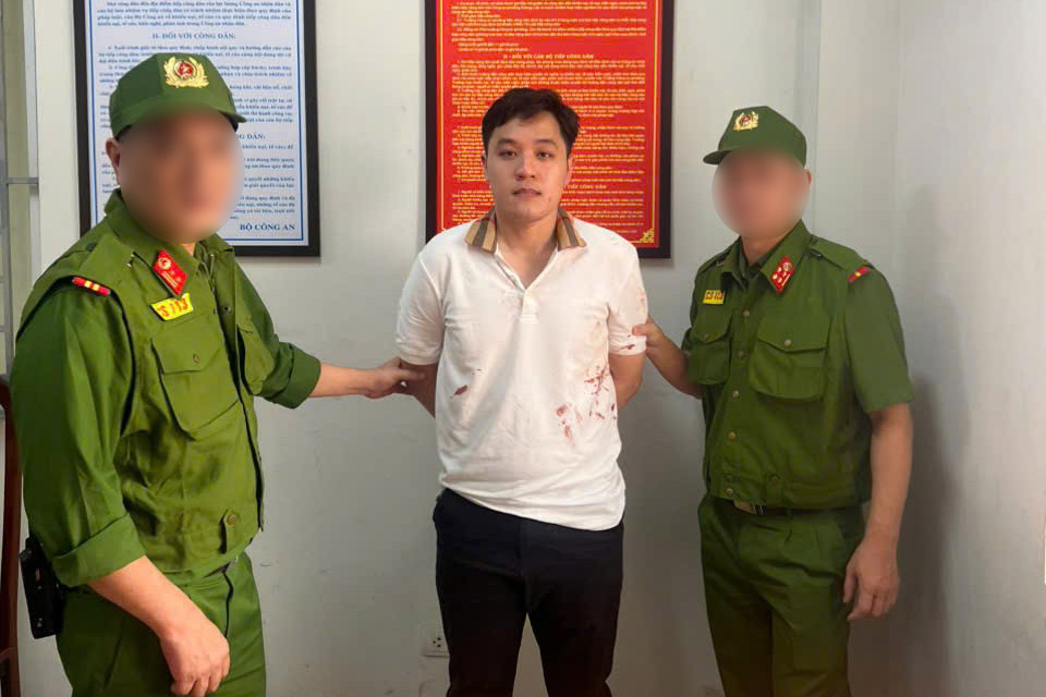 Đối tượng Phạm Hoàng Dũng tại cơ quan Công an. Ảnh: Công an Hà Nội 