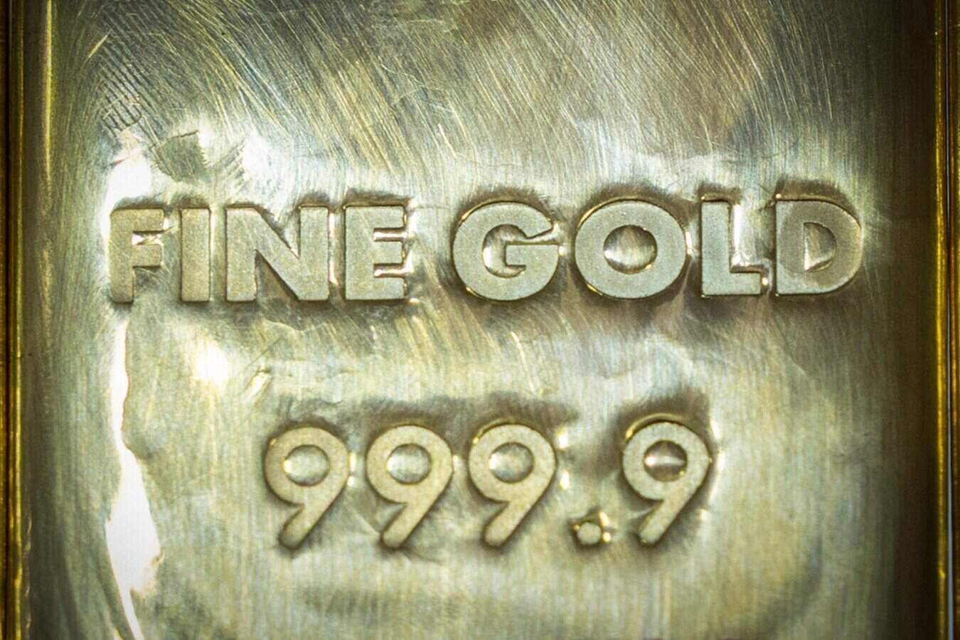 World gold prices are forecast to increase to 8,000 USD/ounce. Photo: AFP