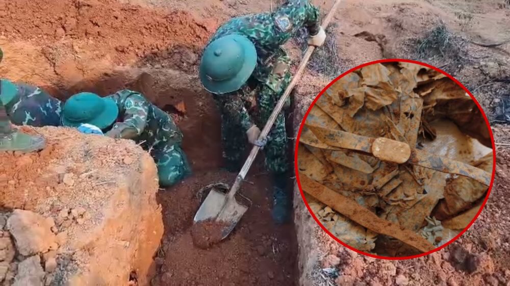 Martyr's remains accompanied by a remnant, a female belt, were discovered in Cha Ly mountain crevice. Photo: Economic - National Defense Team 337