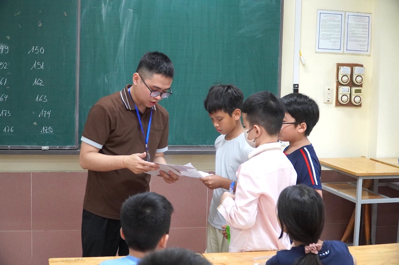 Học sinh dự thi đánh giá năng lực vào lớp 6 Trường THCS và THPT Nguyễn Tất Thành sáng 17.5. Ảnh: Tường Vân