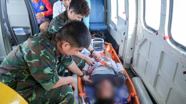 The critically ill patient is being cared for by doctors when taken to the mainland for treatment. Photo: BVCC