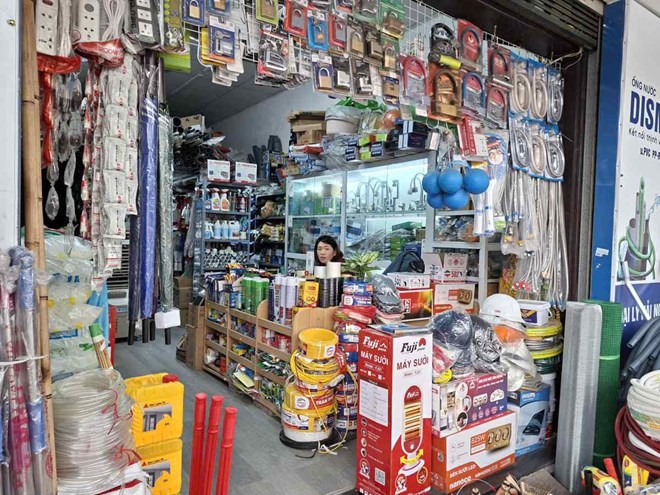 From 2026, business households opening many stores will use a common tax code and must clearly state the business location code on the electronic invoice. Photo: Luc Giang