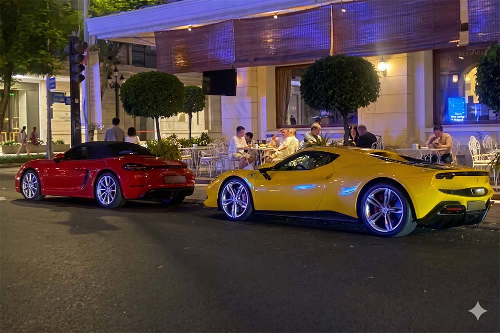 Ferrari 296 GTS (yellow) and Porsche 718 Boxster attract attention when appearing together on the streets of Ho Chi Minh City. Photo: Tri Duc