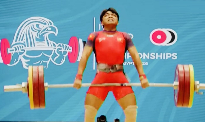 Weightlifter A Tieu won a bronze medal in snatch in the men's 65kg weight class at the tournament. Photo: Vietnam Youth Weightlifting Team