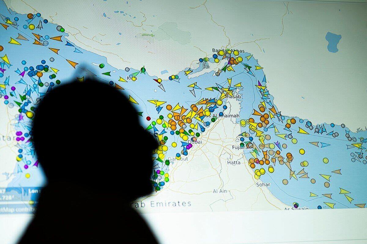 Large screen displays the movement of ships in the Strait of Hormuz on a ship tracking website. Photo: AFP