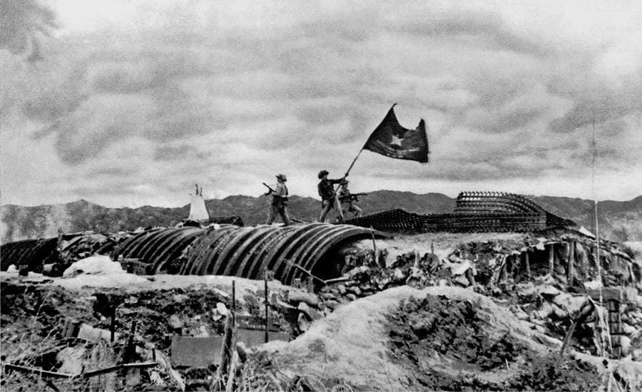 On May 7, 1954, the "Determined to Fight, Determined to Win" flag of the Vietnam People's Army fluttered on the roof of De Castries bunker at Dien Bien Phu stronghold. VNA archival photo
