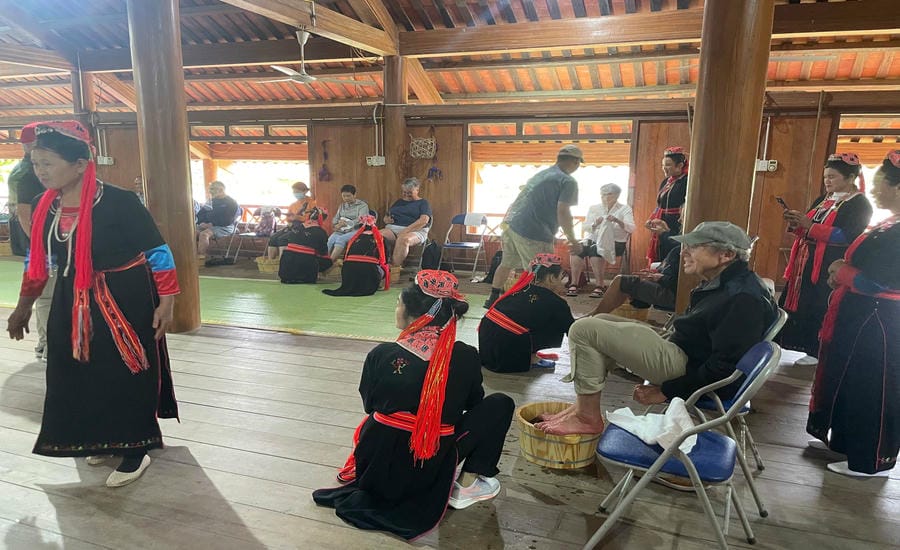 International tourists experience in a mountainous village in former Ha Long City, Quang Ninh province. Photo: Nguyen Hung